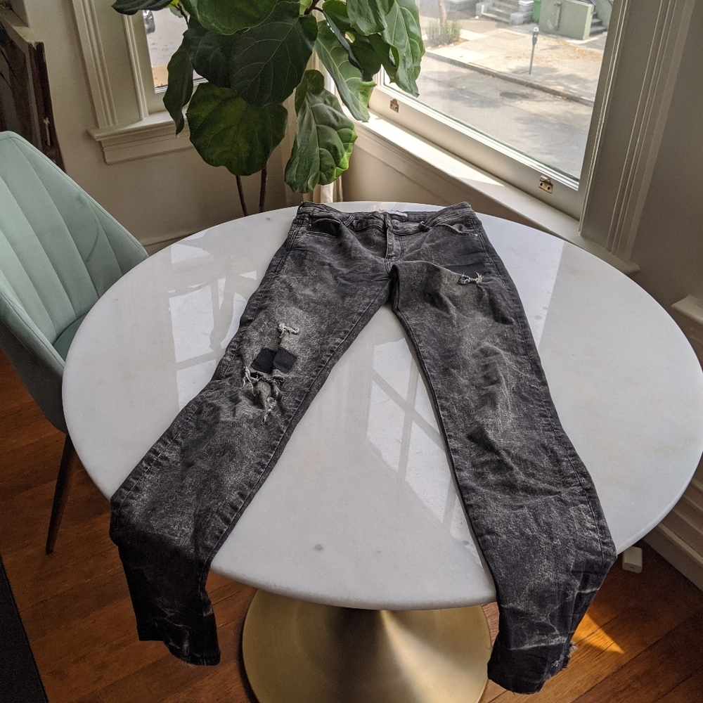 Black distressed skinny jeans